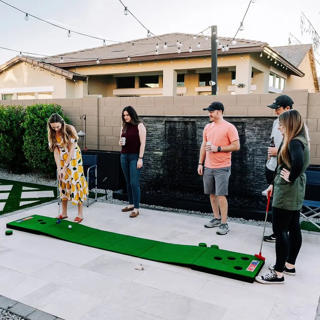 Putterball Golf Game - the Original Backyard Pong Golf Game with Portable Putting Green, Two Golf Balls, Two Putters, and 12 Turf Hole Covers for Lefty and Righty Players